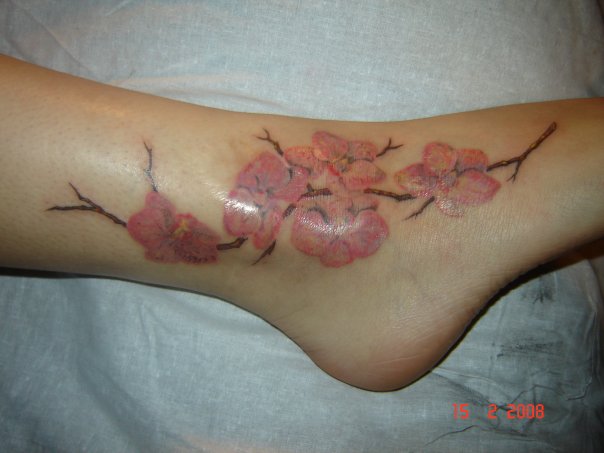 Girl Tattoos on Foot With Sakura 