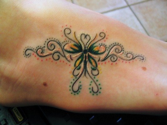 sideways flower tattoos
