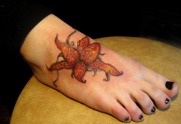 tattoos on foot for girls. Flower Foot Tattoos